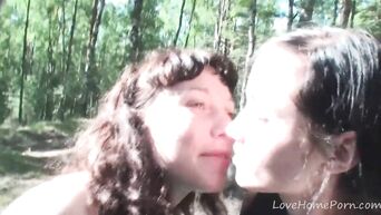 Three young lesbians on forest picnic