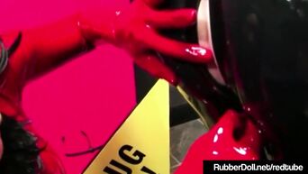 Latex RubberDoll gets lesbian humiliation and strapon sex